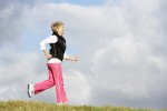 Senior Woman Jogging In The Park